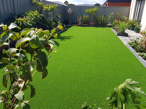 Synthetic grass installation - In this tutorial we demonstrate the step by step process of how to lay an artificial lawn. We showcase how to put the sub-base down, how to apply weed membra...